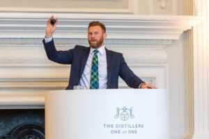 Jonny Fowle Sothebys Global Head of Spirits fielding bids during The Distillers One of One auction Hopetoun-House Scotland 5 October 2023
